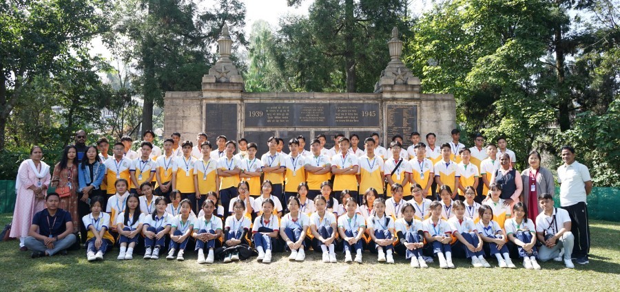 Students and staffs of DMI St Joseph Global School, Ikishe village Chümoukedima at the WW II cemetery in Kohima on November 11.  (Photo Courtesy: DMI SJGS)